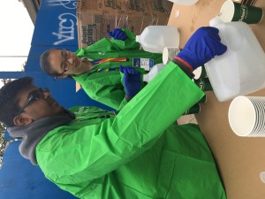 Nikhil Pal and Mengting volunteered at the 2015 New York City Marathon to set up the fluid station by filling water into cups.