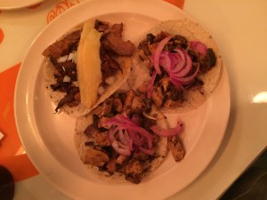 Spicy chicken tacos labeled as Pollo Yucateco on the menu.