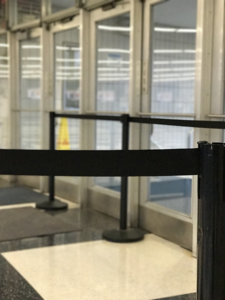 Stanchions in place blocking students from leaving before the end of their scheduled school day