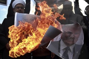 Palestinians burn President Trump's pictures in rage for his speech about Jerusalem said yesterday. Source: Photo Credit: Josef Federman