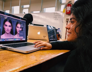 Caption: Student Chelsea Reyes working on a project in Adobe Photoshop, in her shop class, Digital Media Photo Credits: Eashan Nirhoe​​​