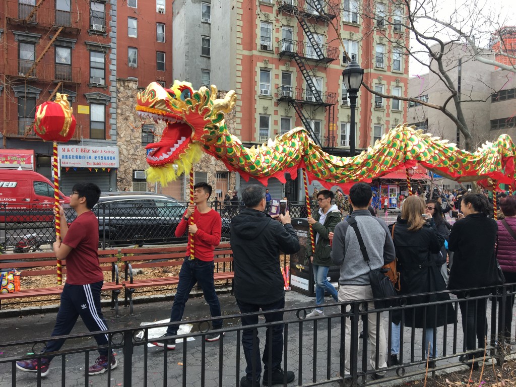 Caption for dragon: Performers carry a dragon through the crowd on poles to spread good luck in a traditional dragon dance.
Photo Credit: Marilyn Ramos