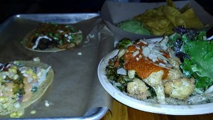 Bottom Right- Cauliflower Brussels AVO Bowl $11, Bottom Left- Rastaman Taco $4, Top Right- Chips and Guacamole with Mango Salsa- $6, Top Left- Ami Shroomer Taco- $4 Credit: Harmeet Minhas