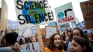 LONDON, ENGLAND - MARCH 15: A girl holds a sign as schoolchildren take part in a student climate protest on March 15, 2019 in London, England. Thousands of pupils from schools, colleges and universities across the UK will walk out today in the second major strike against climate change this year. Young people nationwide are calling on the Government to declare a climate emergency and take action. Similar strikes are taking place around the world today including in Japan and Australia, inspired by 16-year-old Greta Thunberg who criticised world leaders at a United Nations climate conference. (Photo by Jack Taylor/Getty Images)