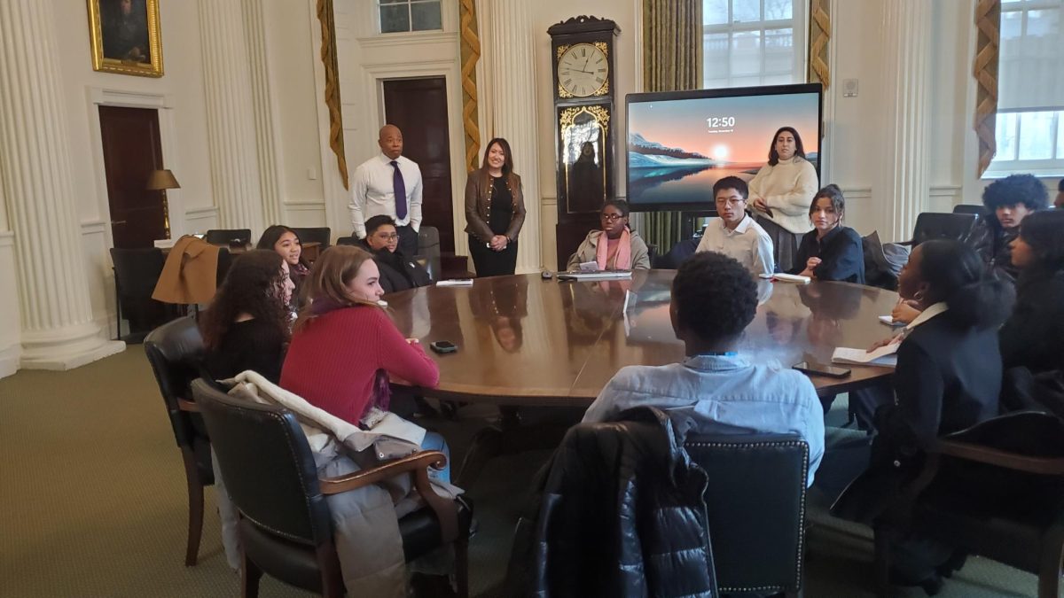 Mayor Adams speaks to students about NYC Transit and OMNY cards.