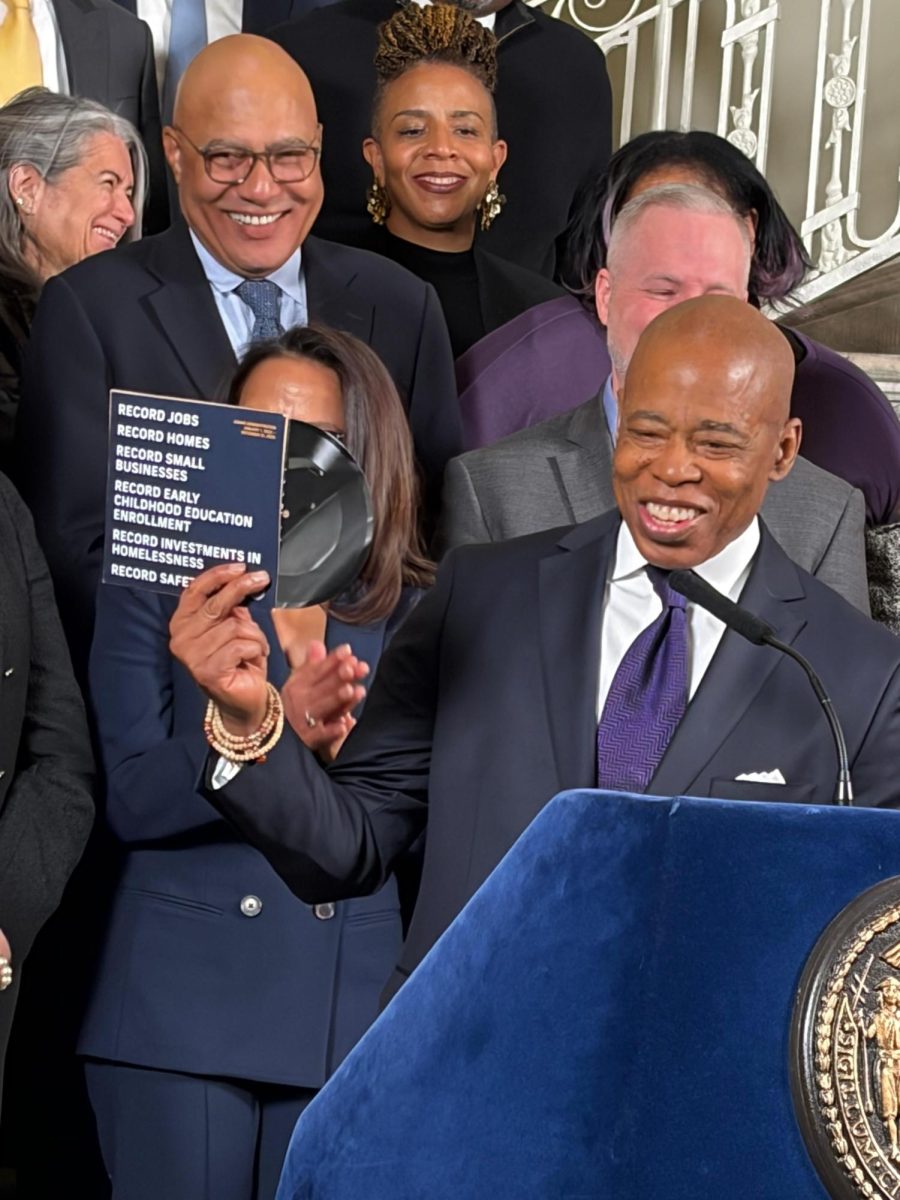 Mayor Adams chose a record for his entry in the time capsule for the record accomplishments his administration claims. He explained to the student journalists present, “This is a record, we used to play music on this."