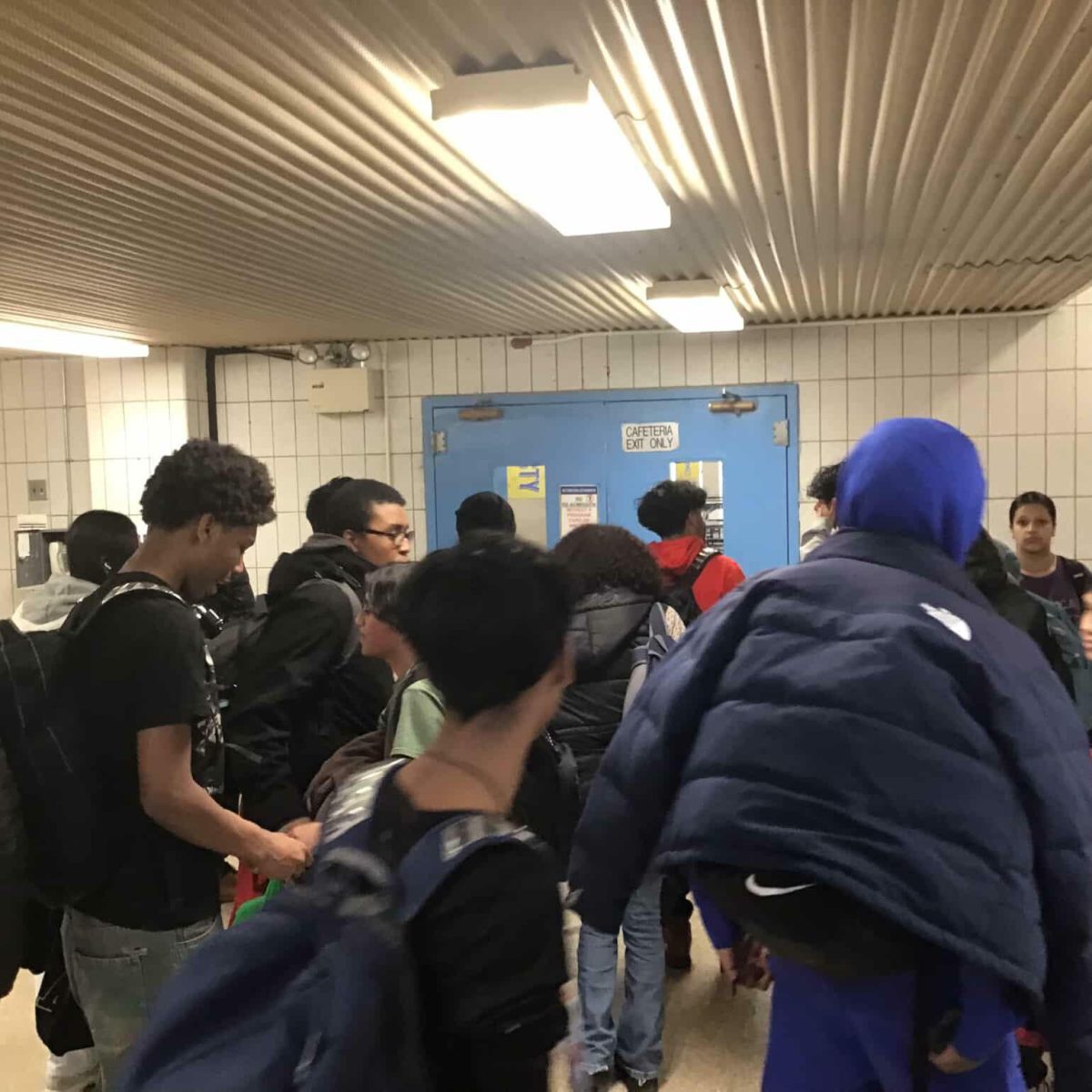 Students prepare to scan in at a more convenient location.