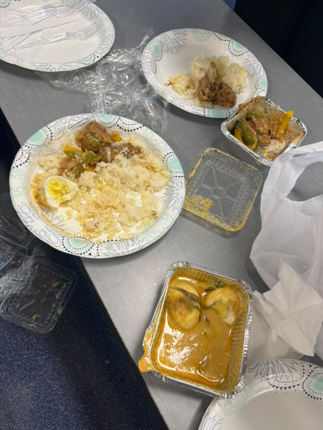 Polao, dim korma (egg curry) and chicken.