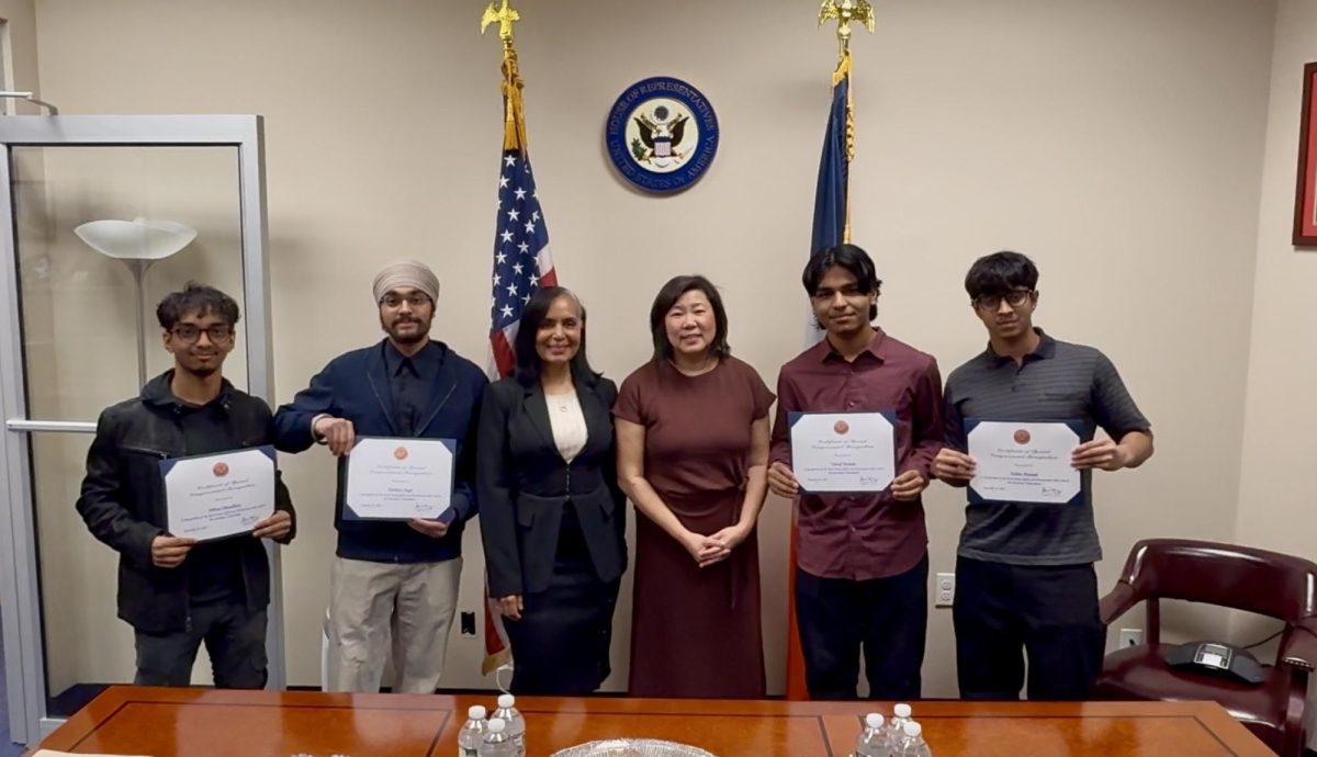 From left to right, students Nibrus Chowdhury, Harbans Singh, Mrs. Sandra Cruz, Congresswoman Grace Meng, Towaf Hossain, and Fahim Ahamed.