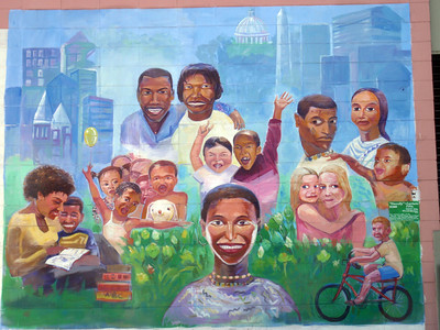 A community mural depicting people from diverse backgrounds. Representation in media and public art can influence how cultures and identities are understood and valued. Credits :"Diversity" by art around is licensed under CC BY 2.0.