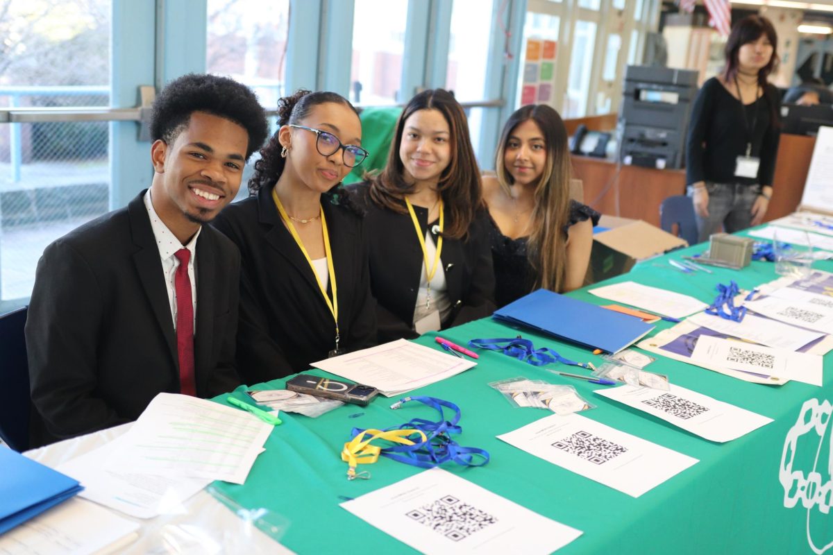 InventMUN Delegates get ready to start the day greeting guests in the lobby.
